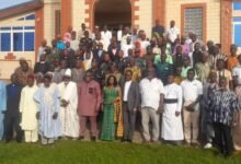 • Mr Seth Acheampong (middle) and stakeholders after the programme