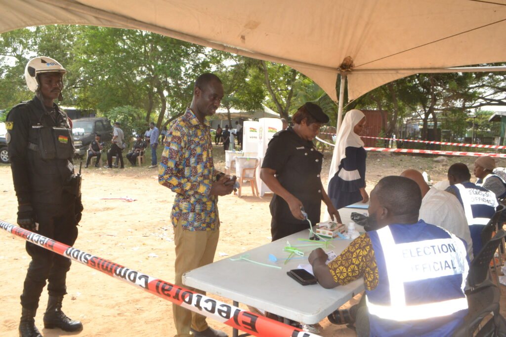 •
Security personnel going through the voting process at the Community 8 police station in Tema Photo: Victor A. Buxton