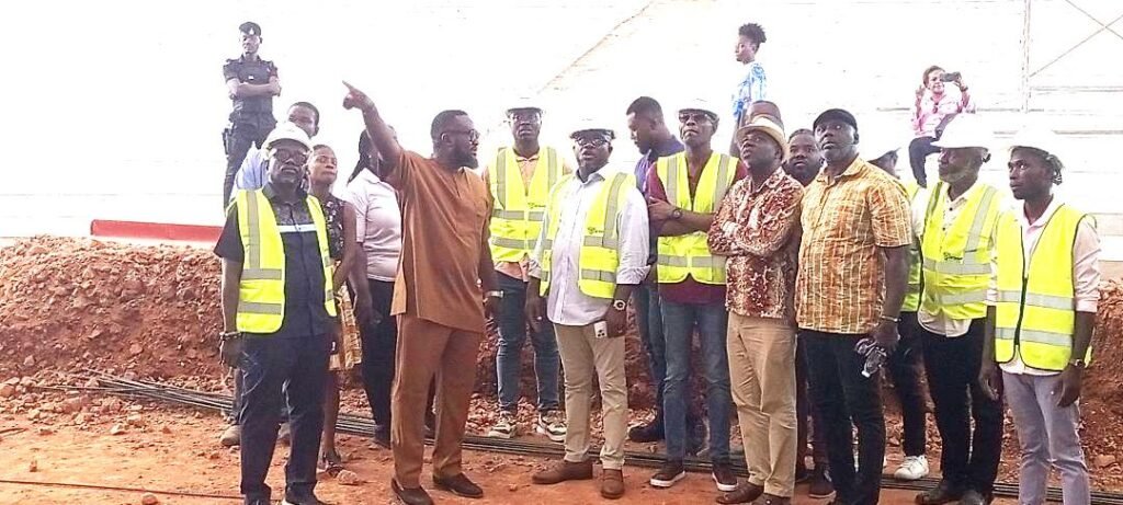Mr Annan (with hands raised) briefs Mr Mercer (middle) and team during the inspection of the theater complex