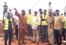 Mr Annan (with hands raised) briefs Mr Mercer (middle) and team during the inspection of the theater complex