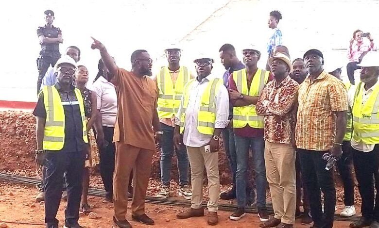 Mr Annan (with hands raised) briefs Mr Mercer (middle) and team during the inspection of the theater complex