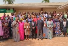 • Mr Dua ( middle, front row) with the participants after the forum