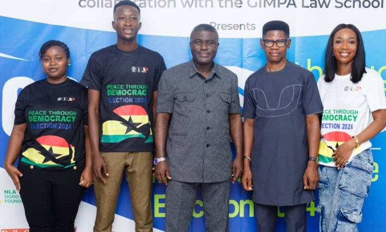 Dr Bossman Asare (middle), Deputy EC Chair, in charge of Corporate Services, Dr Benjamin Agordzo ACP (rtd), (second from right), and some GIMPA Law School students