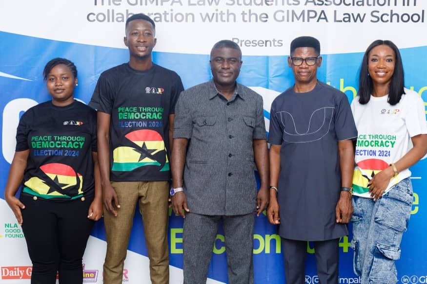 Dr Bossman Asare (middle), Deputy EC Chair, in charge of Corporate Services, Dr Benjamin Agordzo ACP (rtd), (second from right), and some GIMPA Law School students