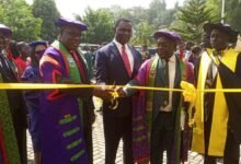 • Dr Adutwum (middle) assisting Prof. Amankwah to unveil the vehicle at the UMaT congregation