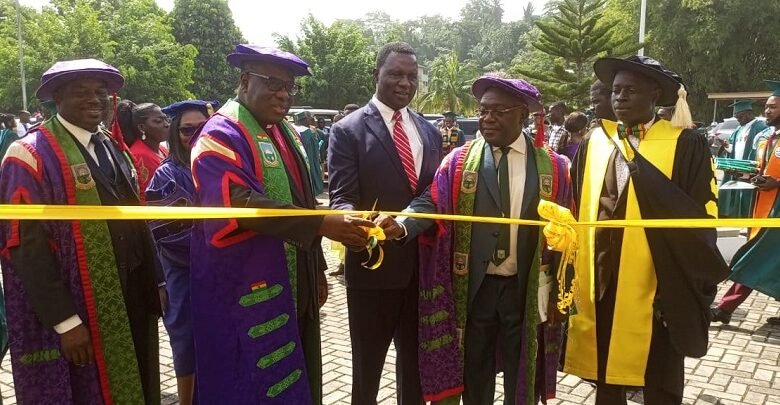 • Dr Adutwum (middle) assisting Prof. Amankwah to unveil the vehicle at the UMaT congregation