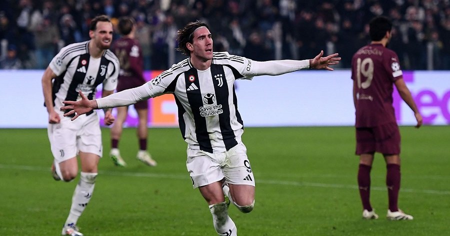 • Vlahović celebrates after scoring the opening goal