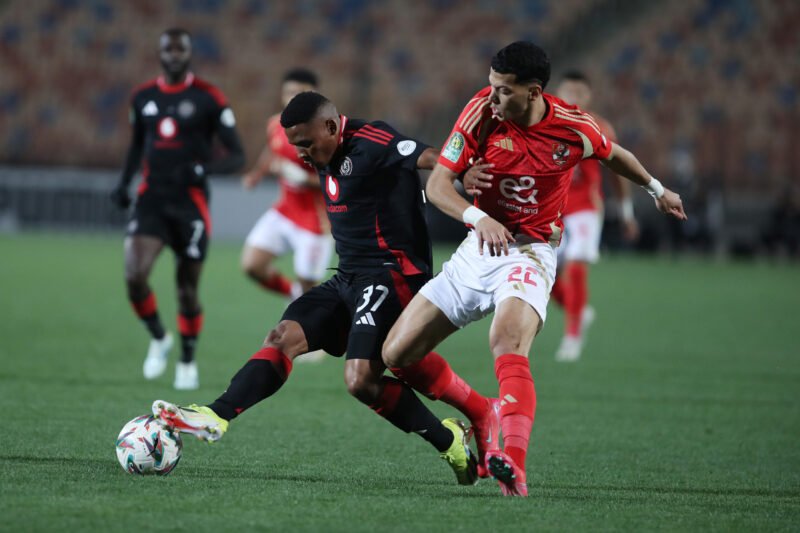 • A scene from the Al Ahly (in red) versus Olando Pirates group clash on Saturday