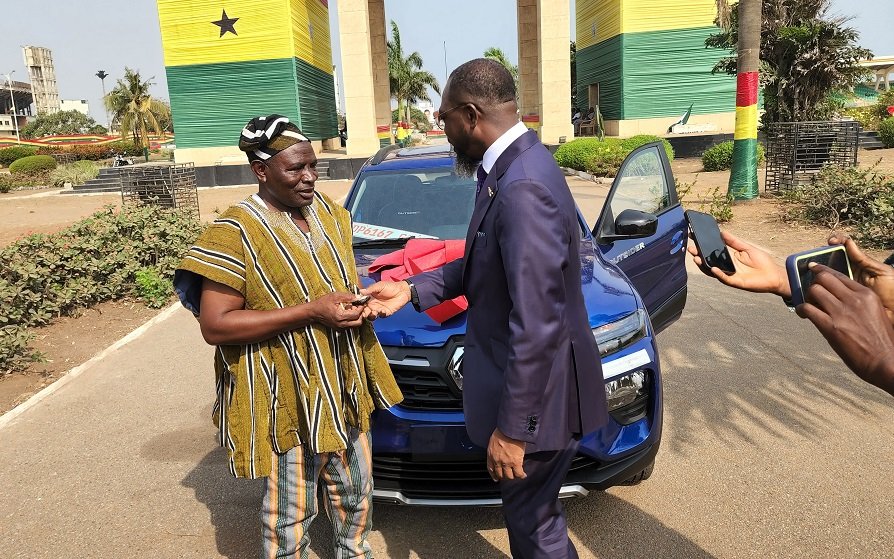 • Alhaji Ayana Yakubu (left) receiving the keys to the vehicle from Mr Kofi Okyere Darko