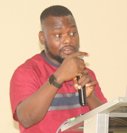• Mr Simon Tichutab Onilimor (inset), Data Scientist, GSS, addressing stakeholders at the programme Photo: Ebo Gorman