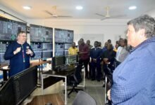 • Mr Ryan Flamand (holding a microphone) demonstrates the simulator to Ambassador Virginia E. Palmer and other dignitaries Photo: Stephanie Birikorang