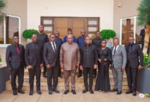 President John Mahama (fourth left) with Rev. Stephen Wengam (to his left) and other family members