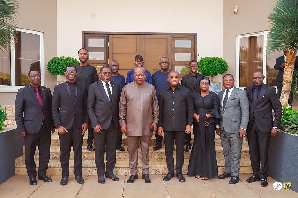 President John Mahama (fourth left) with Rev. Stephen Wengam (to his left) and other family members