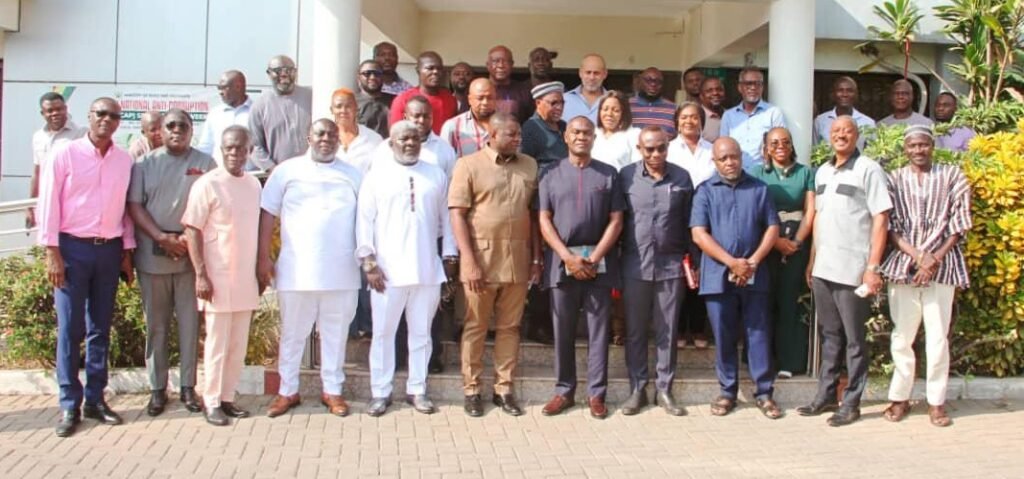 Mr Agbodza (fourth from left) with the contractors