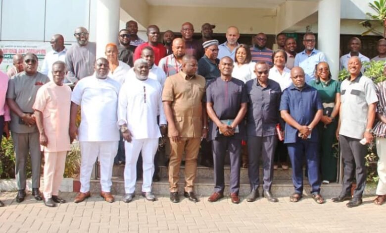 Mr Agbodza (fourth from left) with the contractors