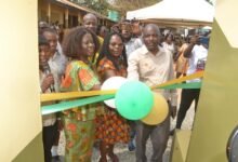 • Mr Muasya (right) being assisted by Mrs Kotomah (left) to commission the facility Photo: Vicxtor A. Buxton