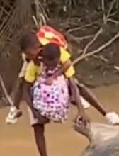 • The school children crossing the river