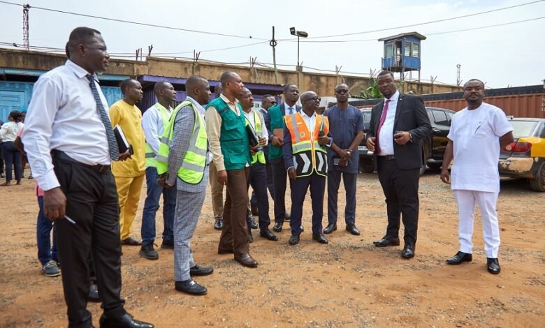 • Mr Kotey in a discussion with some management members at the DVLA office in Tema.To his left is Foster Akwasi Asante