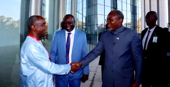 • Dr Brooks Jr (left) ineracting with The Gambian Vice President (right) and Mr Ebrima Sillah