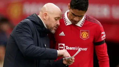 • Erik ten Hag (left) with Raphael Varane