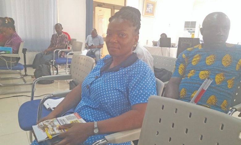 Sirina Mahamadu (inset) addressing participants in the meeting