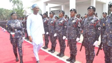 • Mr Mohammed Mubarak Muntaka (second from left) inspecting an all female guard of honour Photo: Victor A. Buxton