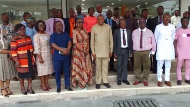 • Mr Pelpuo (middle) with staff of the ministry