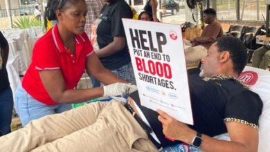 • A staff member of MTN donating blood