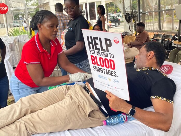 • A staff member of MTN donating blood