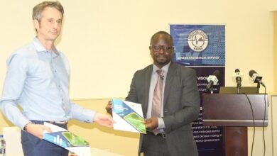Prof. Samuel K. Annin (right) and Dr James Tucker showing the MoU document Photo: Ebo Gorman