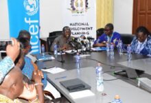 • Dr. Eric Akobeng (middle),Director-Genaral, NDPC addressing stakholders in the meeting