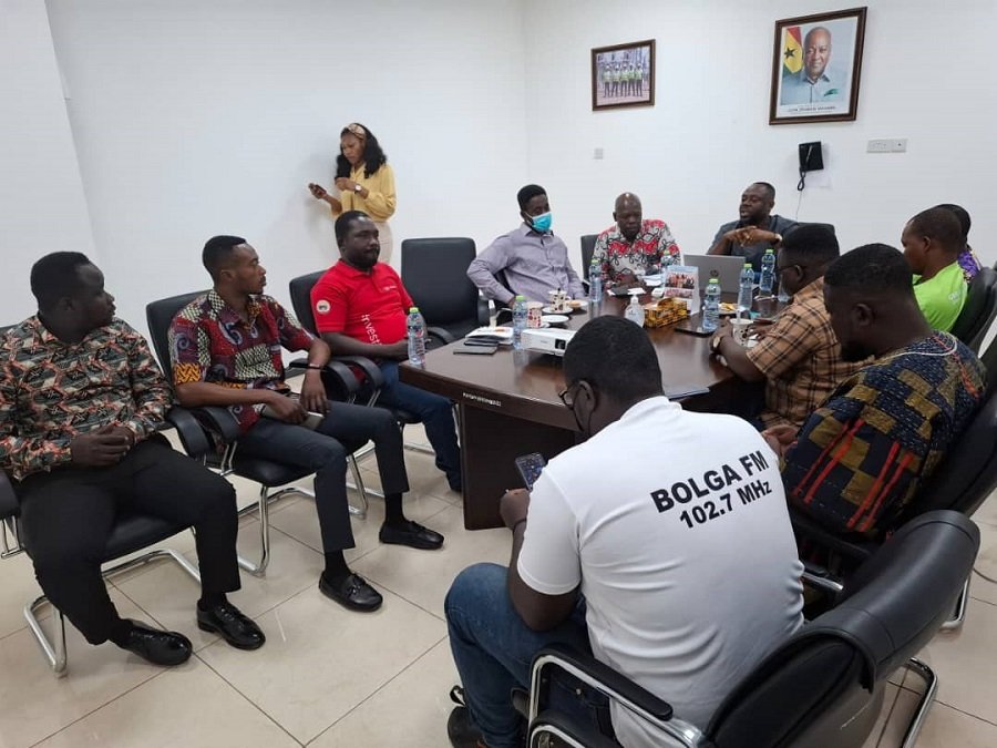 Media persons, staff of PURC in a round table meeting in Bolgatanga