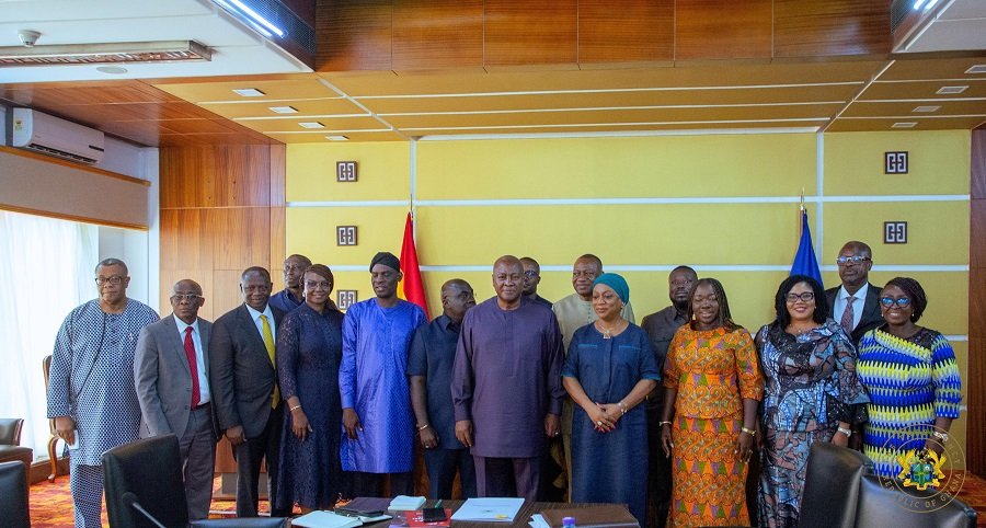• President Mahama (middle) with members of the task force