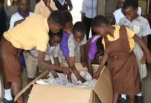 • Some of the beneficiaries picking their items