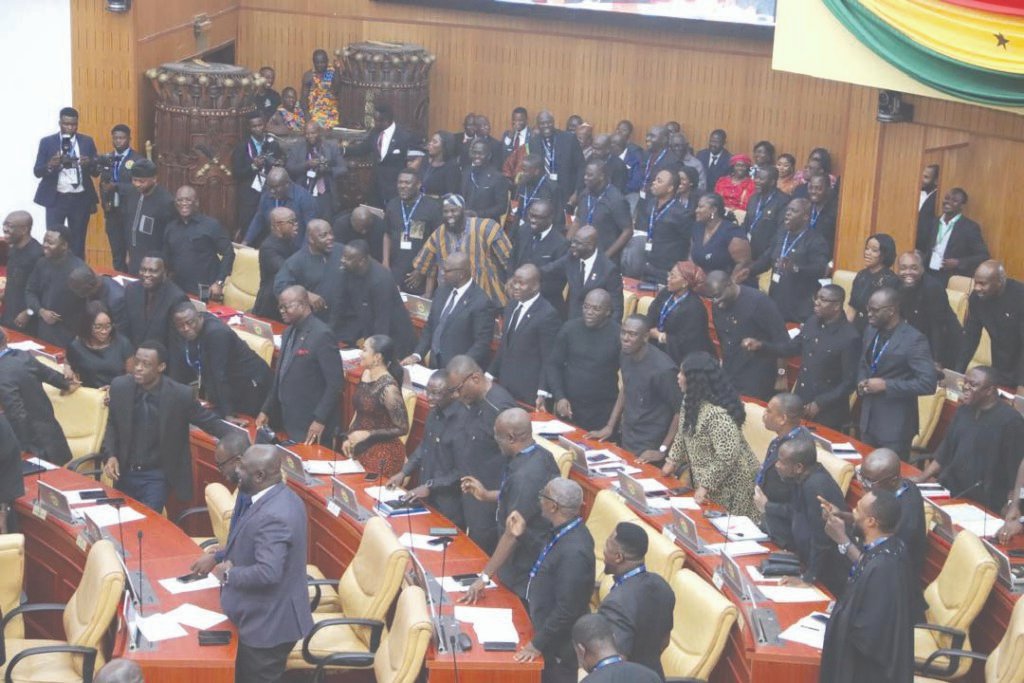 •&#xA;Minority MPs in parliament in all black outfit