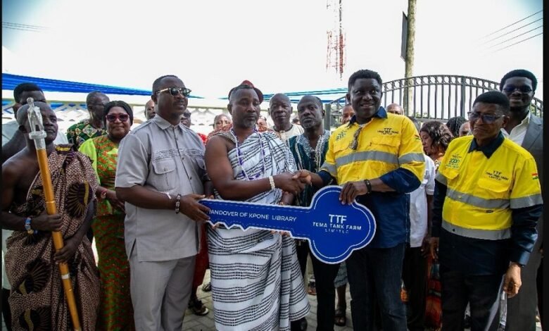 • Mr Kwaku Bediako (second from right) handing over the key of the community library to the traditional ruler