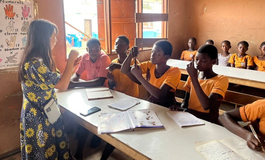 • Ms Haga teaching the students using sign language