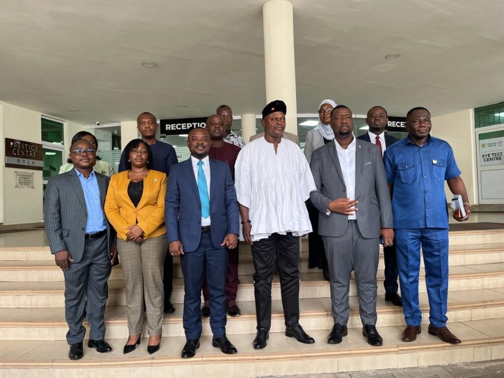 Mr Joseph Nikpe (third right), Chief Executive of DVLA, Mr Julius Neequaye Kotey (second right) with some Executives after the visit
