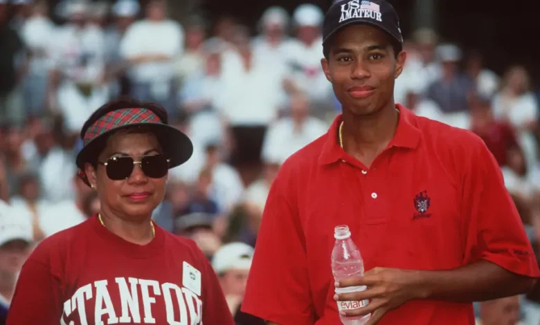 • Woods together with his mother