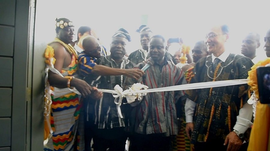 (inset) Mr Akandoh (middle) cutting the tape to inaugurate the facility