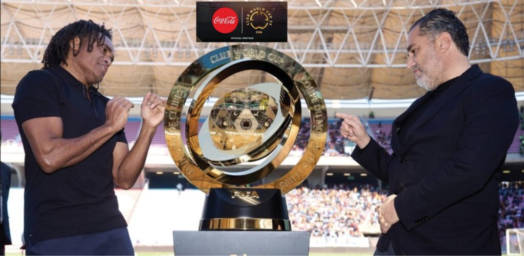Christian Karembeu (left) with the club World Cup trophy