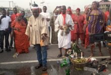 • Nii Ashitey Tetteh (in smock) leading the traditional ceremony to help prevent road crashes on the Awoshie-Pokuase Highway