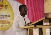 • Prof. Amoako-Gyampah (inset) speaking at the event