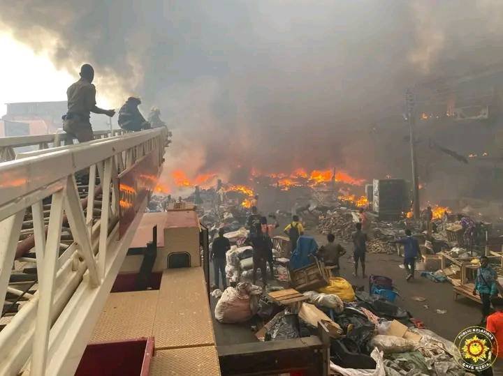 Personnel from the GNFS quenching the fire