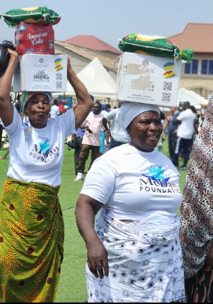 • Some of the widows carrying the items they received