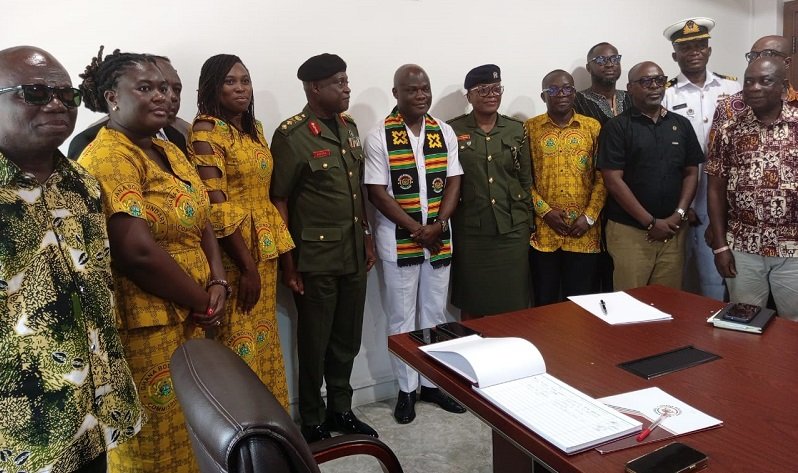 • Major General Emmanuel Wekem Kotia (fourth from left) and Mr Ahmed Ibrahim (middle) with other staff members after the visit
