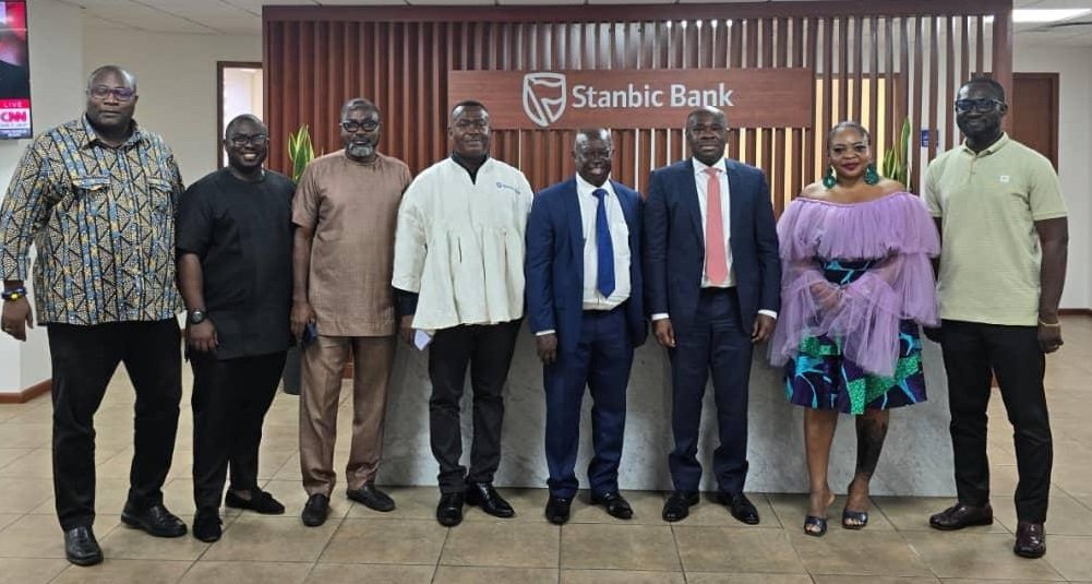• Mr Kwabena Yeboah flanked by Mr Asomaning (third right) and Mr Afadzinu (fourth left) and other executives of SWAG