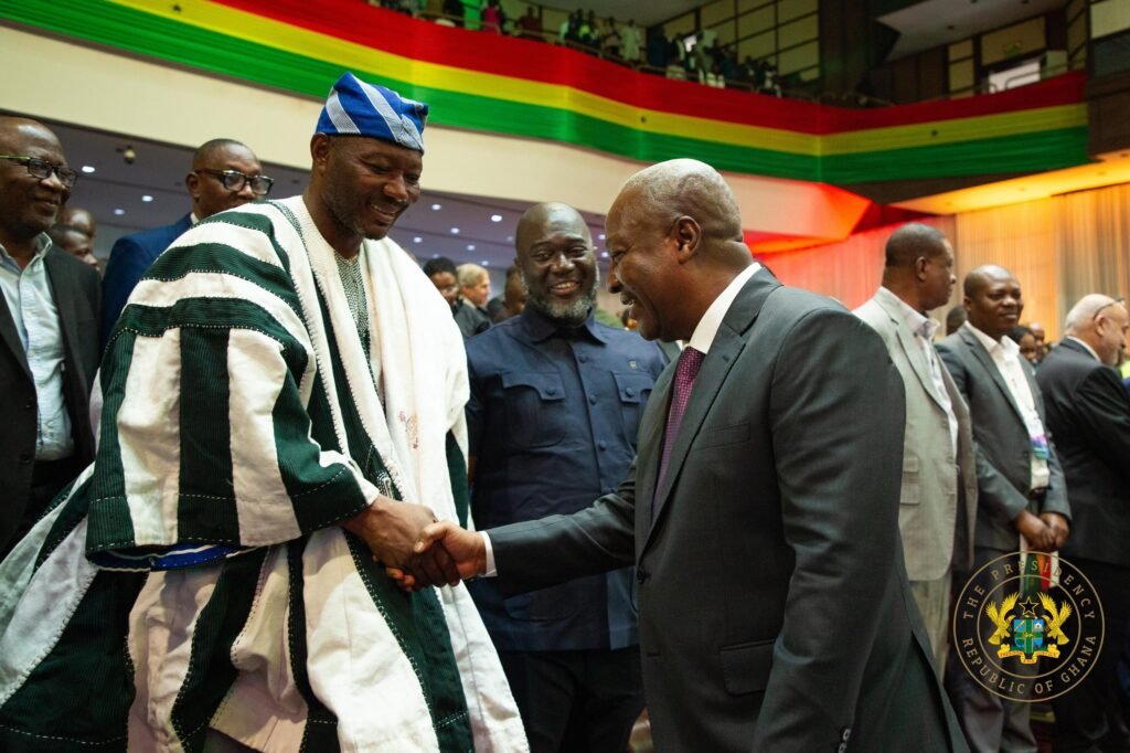 President John Mahama (right) exchanging plesantries with Mr Bernard Mornah