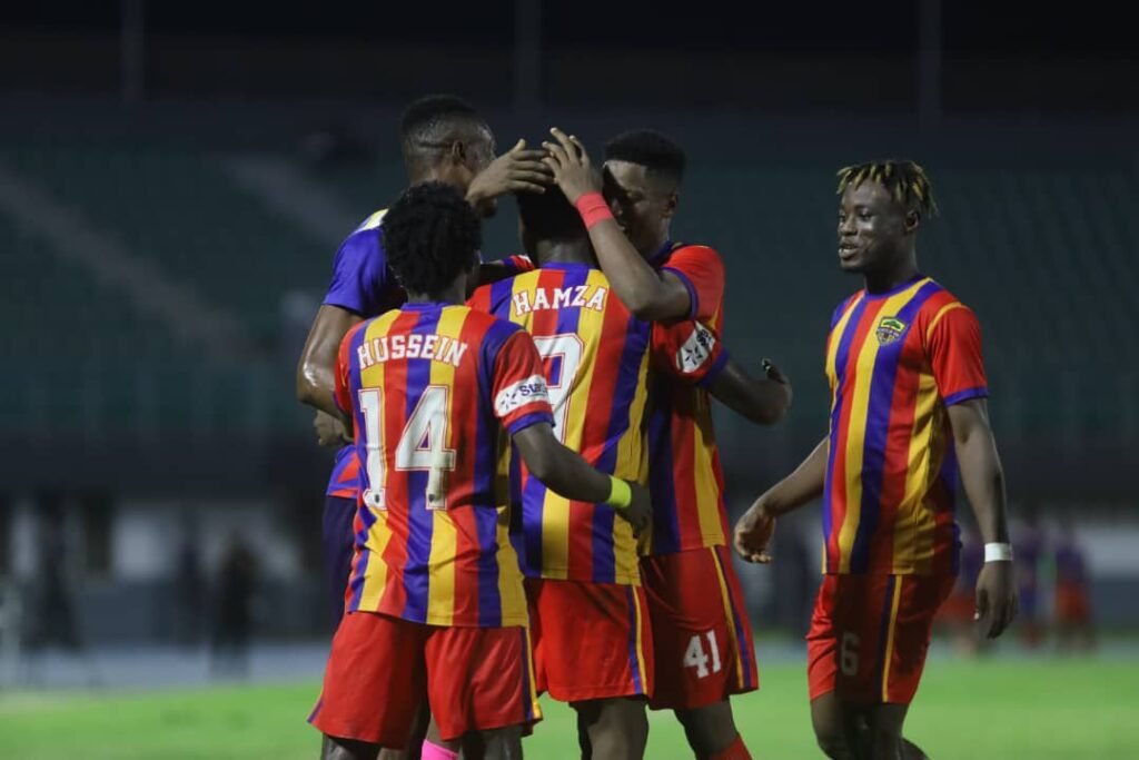 • Players of Hearts of Oak join Issah to celebrate the second goal