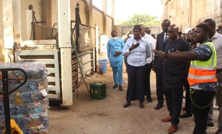 • Mr Ibrahim Murtala Mohammed (second from right) being briefed on plastic recycling process by Mr Christopher Gyan-Mensah (right), Director of Operations Sesa Recycling Limited Photo: Ebo Gorman